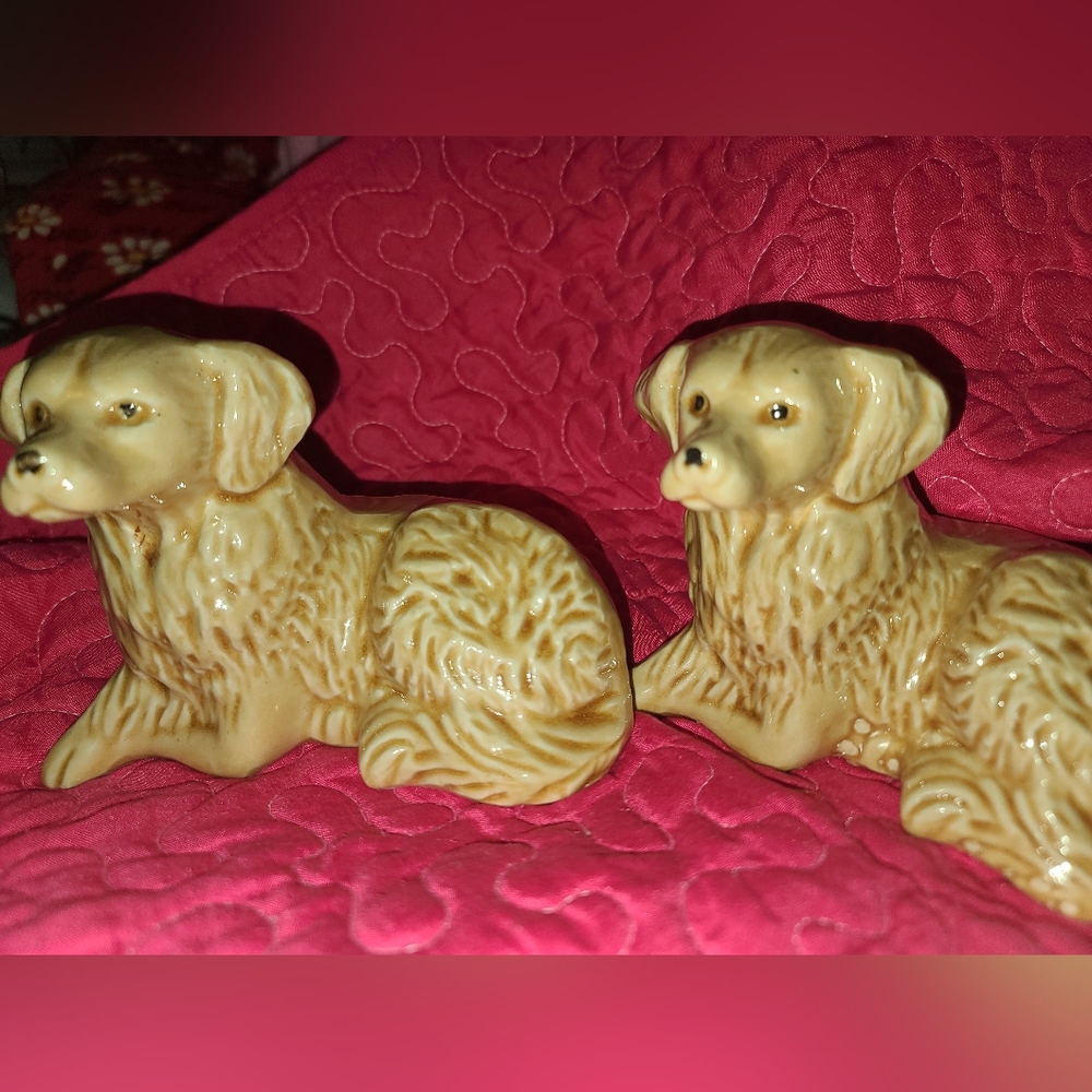 A set of vintage porcelain Golden retriever dogs